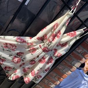 Flower romper dress, from Laura’s Boutique,